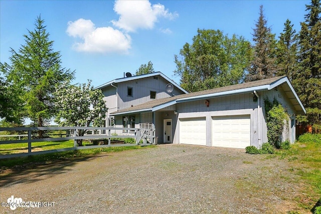 25925 Williamson Ln, Kasilof, AK 99610 - view of front of house featuring an attached garage and driveway