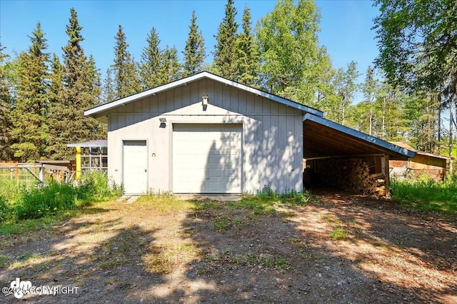 25925 Williamson Ln, Kasilof, AK 99610 - garage featuring a detached garage and driveway
