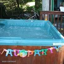 1217 Madsen Ave, Kodiak, AK 99615 - view of swimming pool featuring a hot tub
