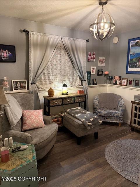 1217 Madsen Ave, Kodiak, AK 99615 - living area with wood finished floors and a notable chandelier