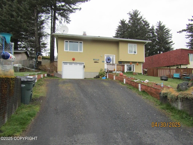 1217 Madsen Ave, Kodiak, AK 99615 - raised ranch featuring driveway and a garage