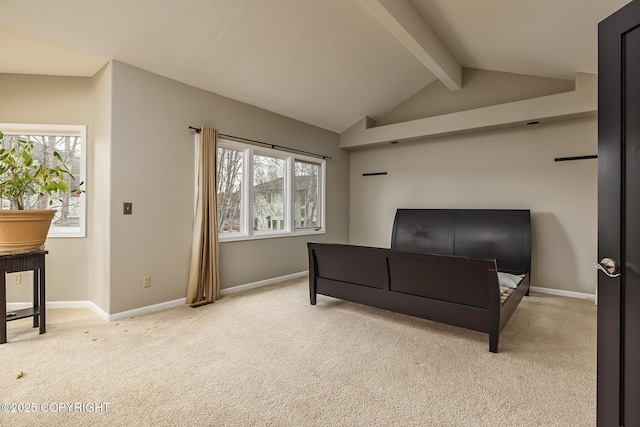 carpeted bedroom featuring baseboards, lofted ceiling with beams, and multiple windows