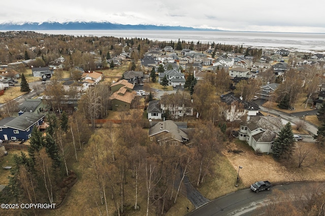 bird's eye view with a water view and a residential view