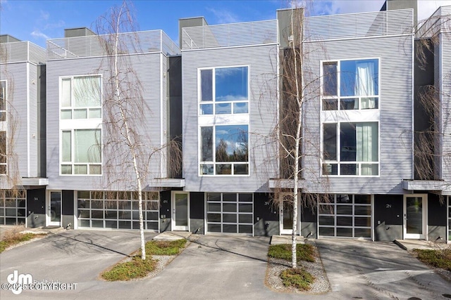 5201 E Northern Lights Blvd # 3N, Anchorage, AK 99508 - view of front of home featuring driveway and a garage