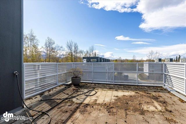 5201 E Northern Lights Blvd # 3N, Anchorage, AK 99508 - view of patio / terrace featuring fence