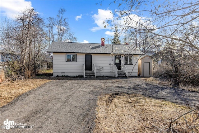 1523 Demeure Pl, Anchorage, AK 99508 - bungalow-style house with a chimney, fence, entry steps, and crawl space