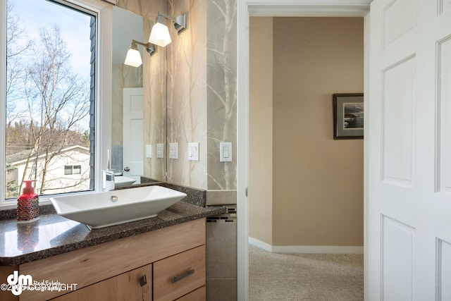 1741 W 15th Ave, Anchorage, AK 99501 - bathroom featuring baseboards and vanity