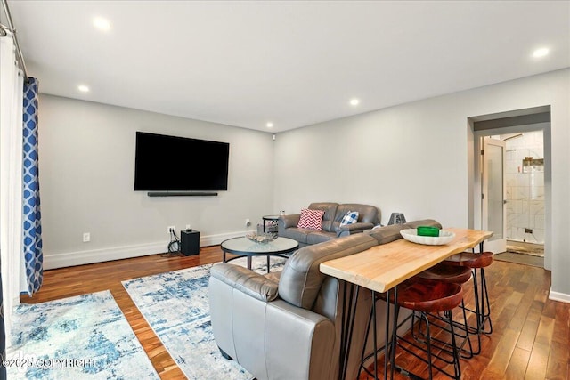 4200 Endeavor Cir, Anchorage, AK 99515 - living area with wood finished floors, recessed lighting, and baseboards