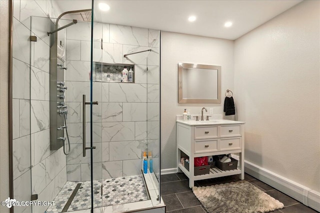 4200 Endeavor Cir, Anchorage, AK 99515 - bathroom with a stall shower, vanity, baseboards, tile patterned flooring, and recessed lighting