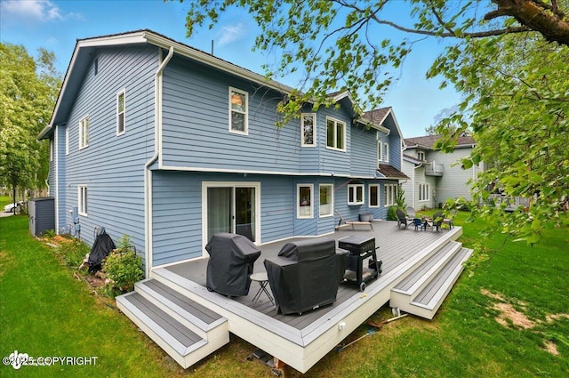 4200 Endeavor Cir, Anchorage, AK 99515 - back of property featuring a wooden deck and a yard