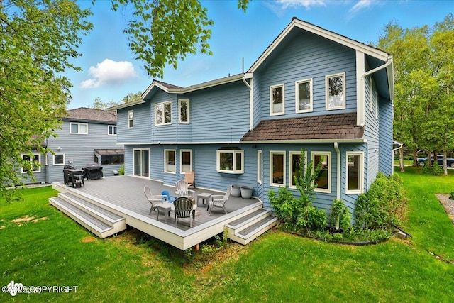 4200 Endeavor Cir, Anchorage, AK 99515 - rear view of house with a lawn and a deck