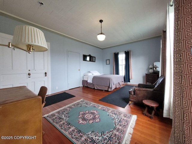 1 Fort Seward Dr, Haines, AK 99827 - bedroom with crown molding and wood finished floors