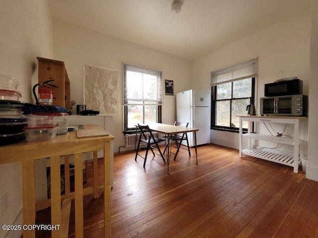 1 Fort Seward Dr, Haines, AK 99827 - dining room with a toaster, hardwood / wood-style floors, and plenty of natural light