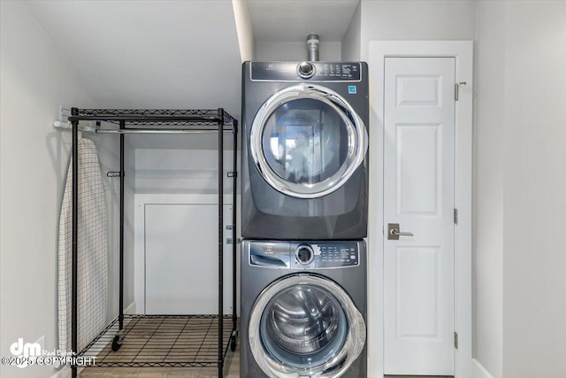 885 Soundview Ave, Homer, AK 99603 - clothes washing area with stacked washer and dryer and laundry area