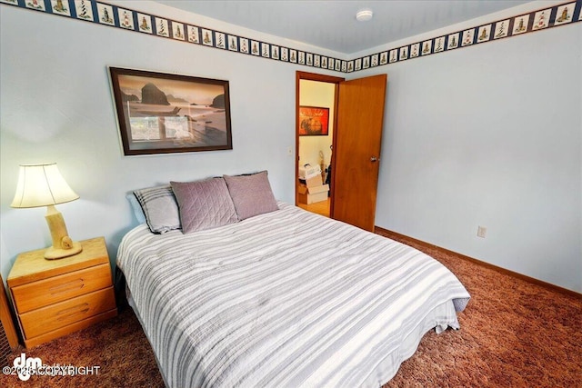 carpeted bedroom with baseboards