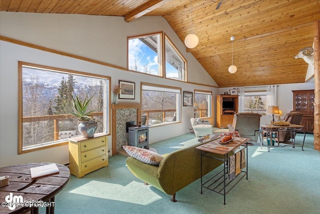 3669 Pullen Cir, Eagle River, AK 99577 - living room featuring carpet, a wood stove, wooden ceiling with exposed beams, and high vaulted ceiling