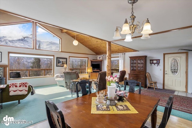 3669 Pullen Cir, Eagle River, AK 99577 - dining area featuring a chandelier and high vaulted ceiling