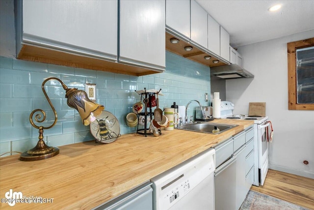 3669 Pullen Cir, Eagle River, AK 99577 - kitchen featuring a sink, white appliances, tasteful backsplash, and light wood finished floors