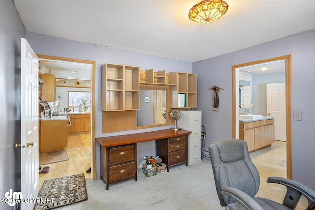 3669 Pullen Cir, Eagle River, AK 99577 - office area featuring a sink and light colored carpet