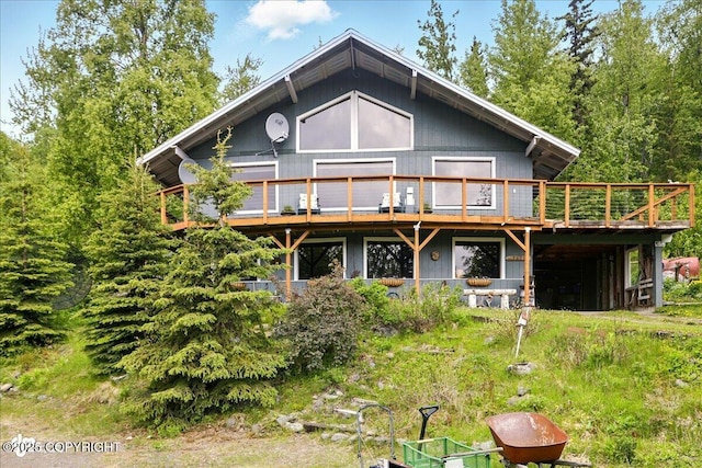 3669 Pullen Cir, Eagle River, AK 99577 - back of property with a wooden deck