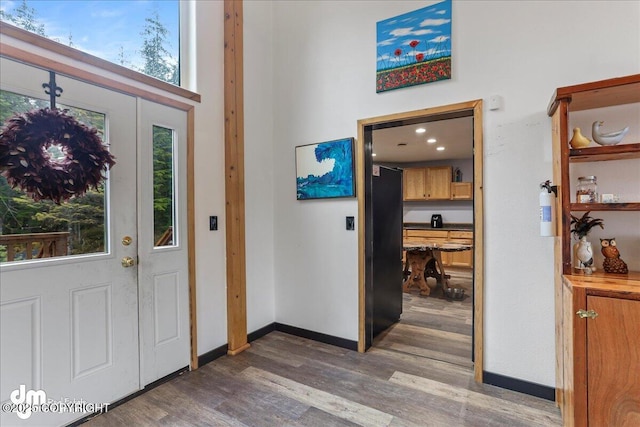 10912 Wolf Trail Cir, Seward, AK 99664 - foyer with wood finished floors and baseboards