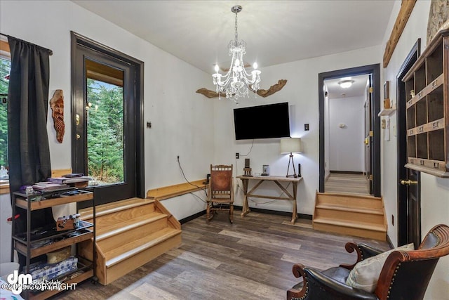 10912 Wolf Trail Cir, Seward, AK 99664 - living area featuring wood finished floors and a chandelier