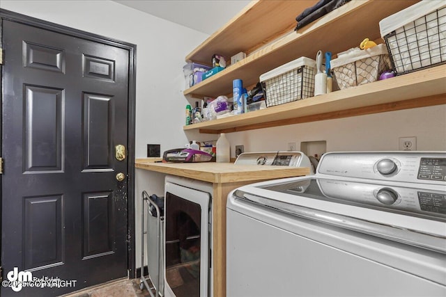 10912 Wolf Trail Cir, Seward, AK 99664 - washroom with washing machine and dryer