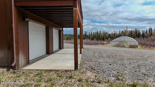 575 Pace St, Soldotna, AK 99669 - view of yard with an outbuilding and a garage