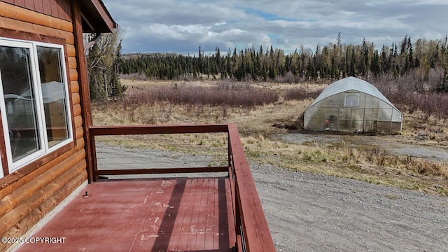 575 Pace St, Soldotna, AK 99669 - view of yard with a wooden deck and an exterior structure