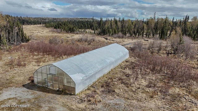 575 Pace St, Soldotna, AK 99669 - entry to storm shelter with a greenhouse and an outbuilding