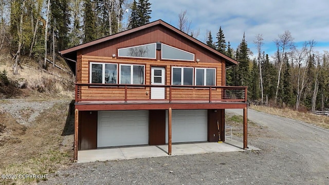 575 Pace St, Soldotna, AK 99669 - view of front facade featuring an attached garage and driveway