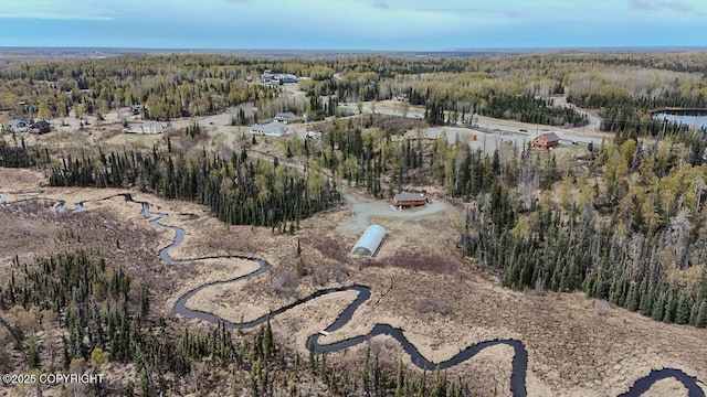 575 Pace St, Soldotna, AK 99669 - aerial view of property's location featuring a heavily wooded area