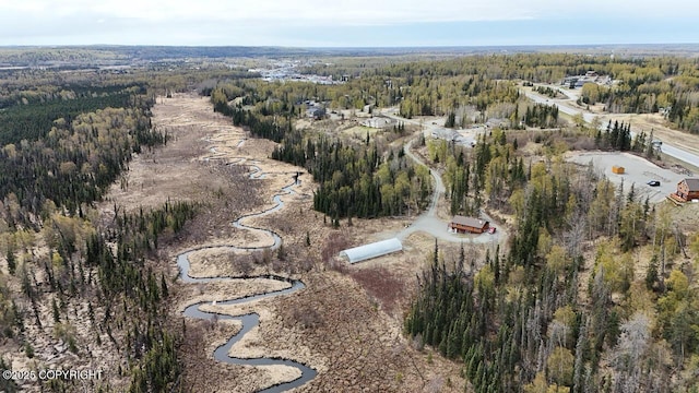 575 Pace St, Soldotna, AK 99669 - aerial view of property's location with a heavily wooded area