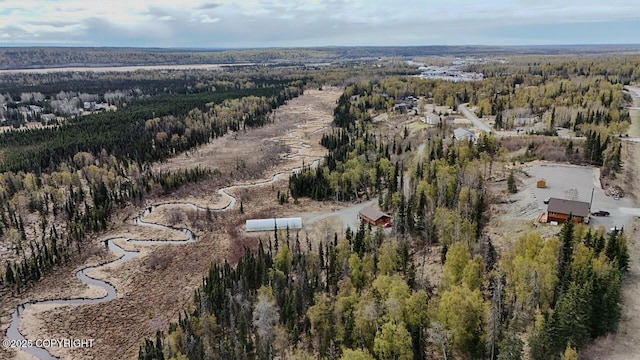 575 Pace St, Soldotna, AK 99669 - aerial view of property's location featuring a heavily wooded area