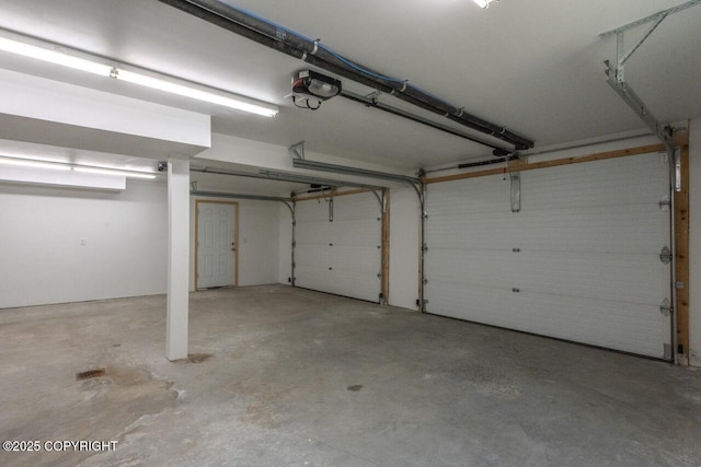 575 Pace St, Soldotna, AK 99669 - garage featuring a garage door opener