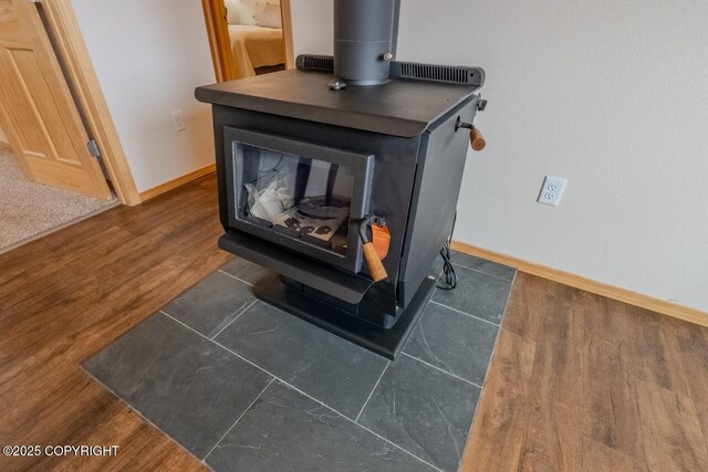 575 Pace St, Soldotna, AK 99669 - detailed view of a wood stove and baseboards