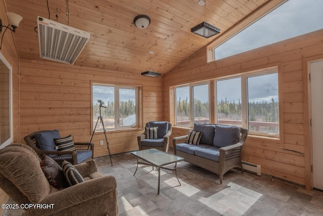 575 Pace St, Soldotna, AK 99669 - sunroom / solarium featuring a baseboard radiator, plenty of natural light, and lofted ceiling