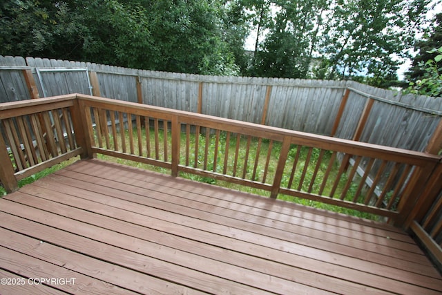 11725 Birch Knoll Loop, Anchorage, AK 99515 - wooden deck with a fenced backyard