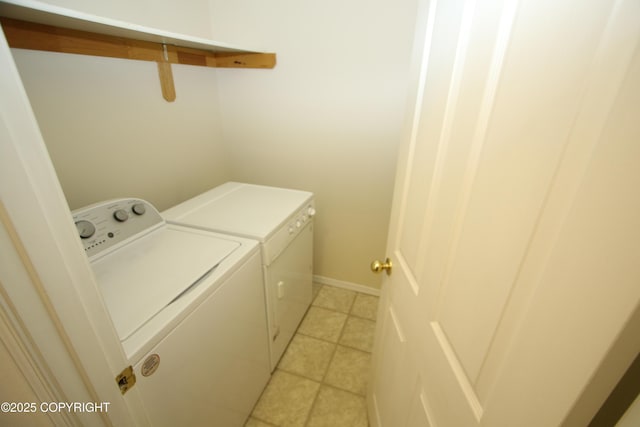 11725 Birch Knoll Loop, Anchorage, AK 99515 - laundry room featuring washing machine and clothes dryer and light tile patterned flooring