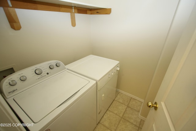 11725 Birch Knoll Loop, Anchorage, AK 99515 - laundry room featuring washing machine and dryer and light tile patterned flooring