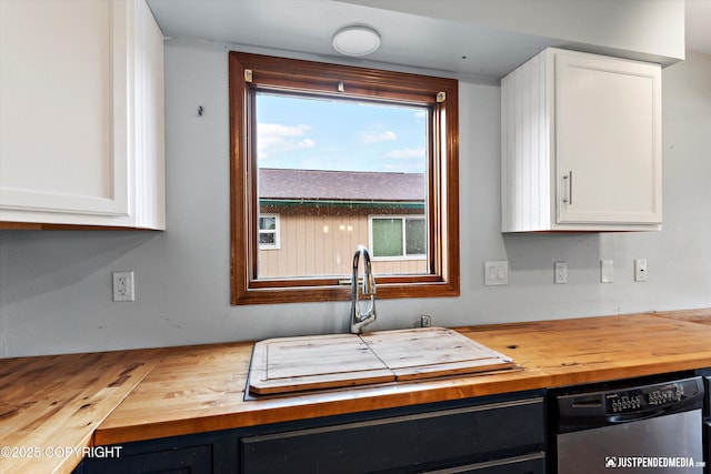 3810 Midvale Cir, Anchorage, AK 99507 - kitchen with wooden counters, white cabinets, a sink, and dishwasher