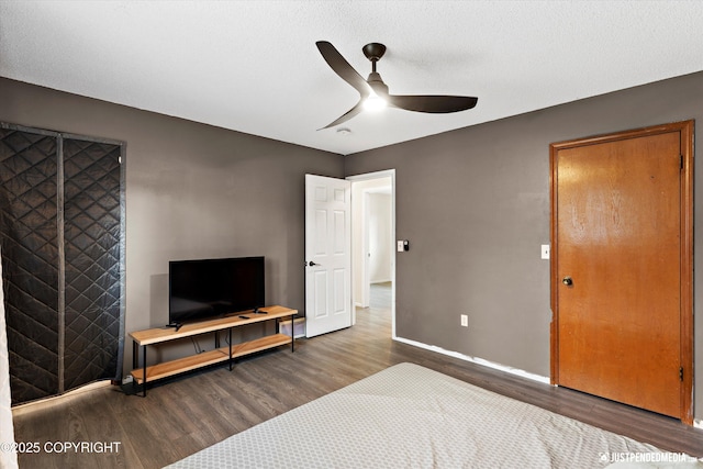 3810 Midvale Cir, Anchorage, AK 99507 - bedroom with baseboards, ceiling fan, and wood finished floors