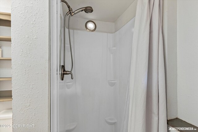3810 Midvale Cir, Anchorage, AK 99507 - full bath featuring a shower with shower curtain