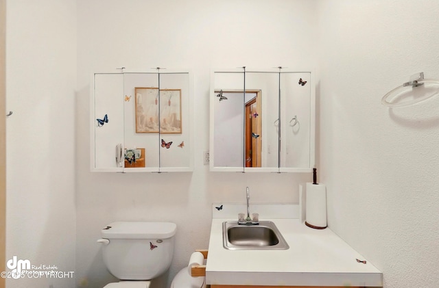 29425 Fools Gold St, Soldotna, AK 99669 - half bathroom featuring a sink and toilet