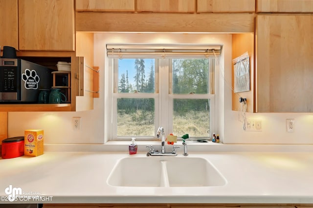 29425 Fools Gold St, Soldotna, AK 99669 - kitchen with a sink and light countertops
