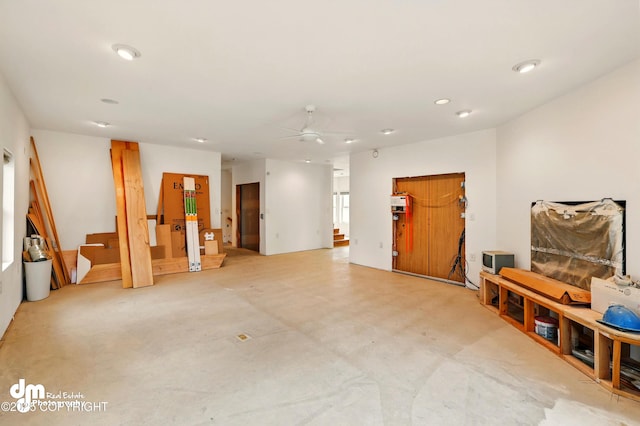29425 Fools Gold St, Soldotna, AK 99669 - living room with stairs, a ceiling fan, and recessed lighting