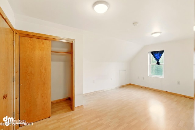 29425 Fools Gold St, Soldotna, AK 99669 - bonus room with light wood-style flooring, lofted ceiling, and baseboards