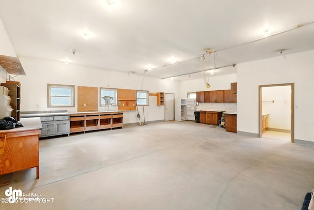 29425 Fools Gold St, Soldotna, AK 99669 - garage featuring baseboards