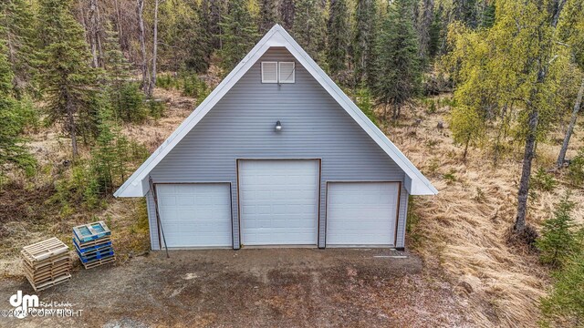 29425 Fools Gold St, Soldotna, AK 99669 - detached garage with a forest view