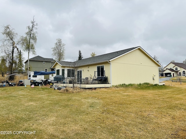 5789 S Hanson Loop, Wasilla, AK 99654 - rear view of property featuring a deck and a yard